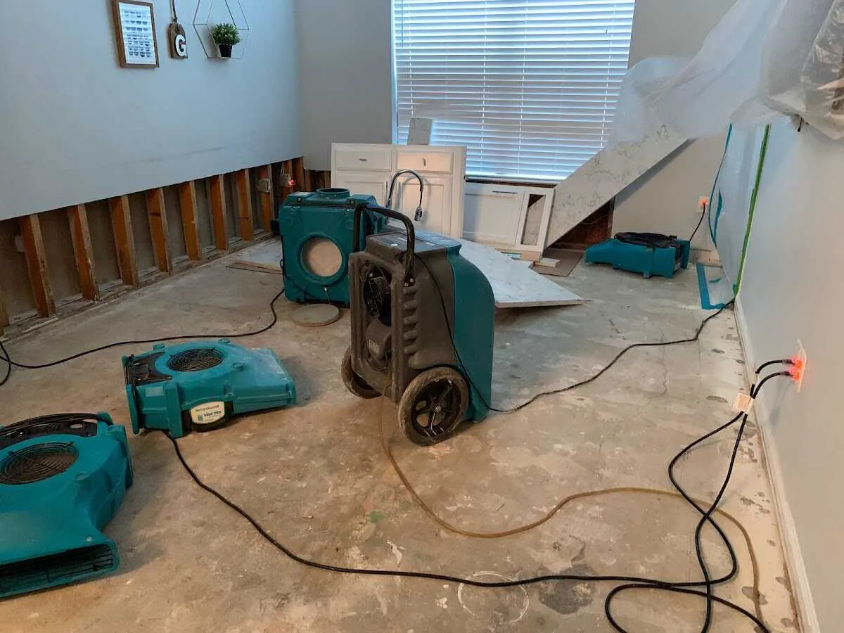 Dehumidifier in flood-cut room for Water Damage Restoration in White Bear Lake